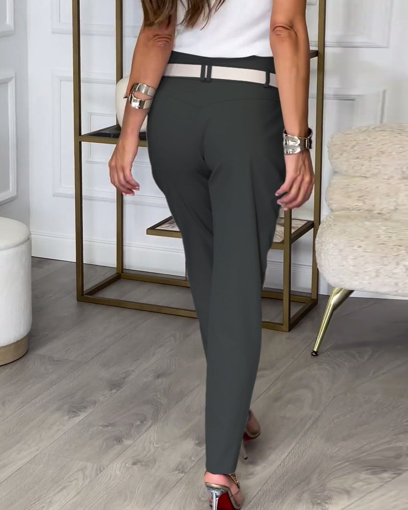 Merel - Patchwork trousers with belt